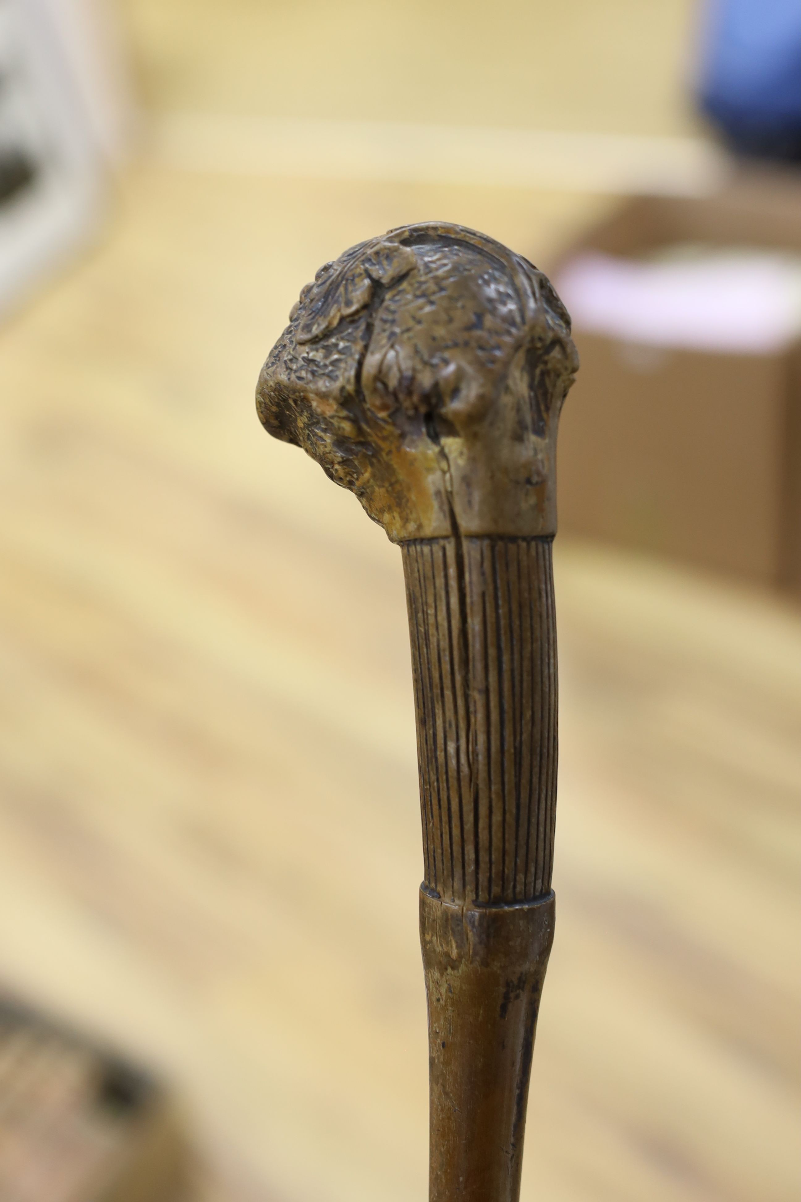 A 19th century folk art walking stick, 89 cms long.